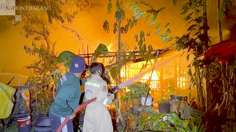 Disabled woman escapes just in time as fire hits 10 homes in Samut Prakan Disabled woman escapes just in time as fire hits 10 homes in Samut Prakan