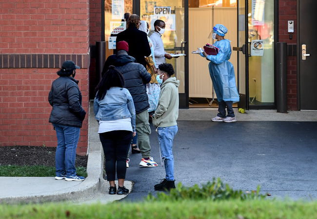 A line for coronavirus tests at the Angarai Testing Center in Silver Spring, Md., on Nov. 18. Experts say the winter is expected to bring a spike in virus cases much higher than seen the beginning of the pandemic. MUST CREDIT: Washington Post photo by Toni L. Sandys