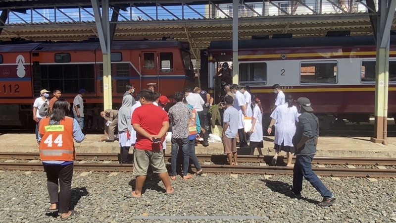 Monk steps into path of speeding train Monk steps into path of speeding train