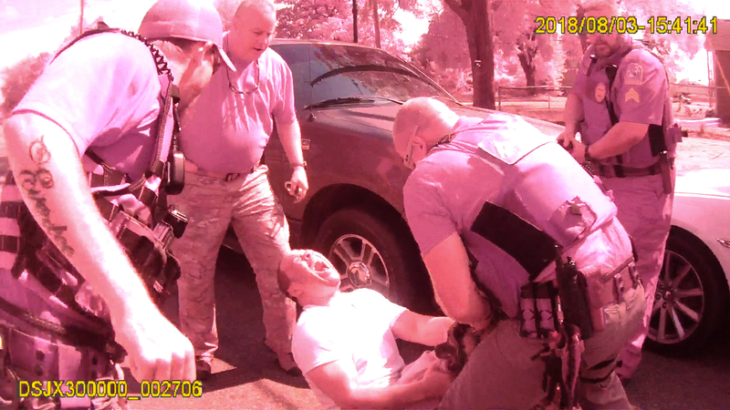 Robert Fitts screams as a K-9 attacks him after he was pulled over by police for a traffic violation in Selma, Ala., on Aug. 3, 2018. MUST CREDIT: Selma Police Department