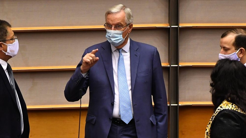 Michel Barnier, chief negotiator for the European Union, center, wears a protective face mask while speaking with lawmakers ahead of a State of the Union address in the European Parliament in Brussels on Sept. 16, 2020. MUST CREDIT: Bloomberg photo by Geert Vanden Wijngaert.