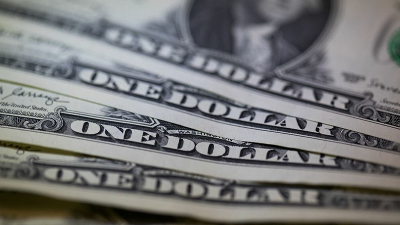 A collection of $1 bills are displayed in an arranged photograph on Aug. 5, 2019. MUST CREDIT: Bloomberg photo by Chris Ratcliffe.