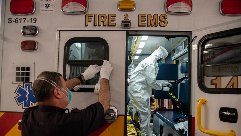 EMS and firefighters in Washington D.C. prepare for a shift. MUST CREDIT: Washington Post photo by Jahi Chikwendiu
