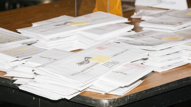 Absentee ballots sit in stacks during a recount of Milwaukee County results at the Wisconsin Center on Nov. 20, 2020. MUST CREDIT: Photo for The Washington Post by Taylor Glascock