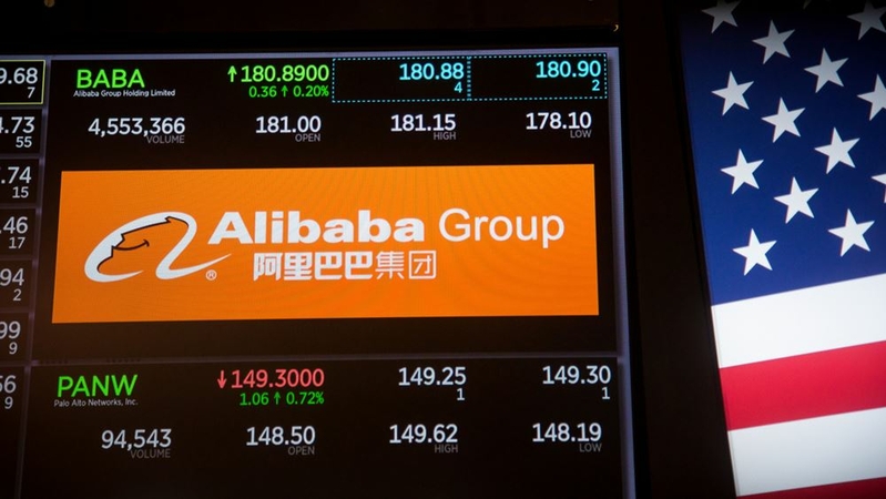 A monitor displays Alibaba Group Holding signage on the floor of the New York Stock Exchange in New York on Oct. 13, 2017. MUST CREDIT: Bloomberg photo by Michael Nagle.