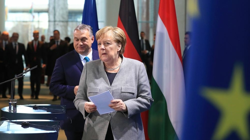 German Chancellor Angela Merkel, followed by Hungarian Prime Minister Viktor Orban, in Berlin on Feb. 10, 2020. MUST CREDIT: Bloomberg photo by Krisztian Bocsi