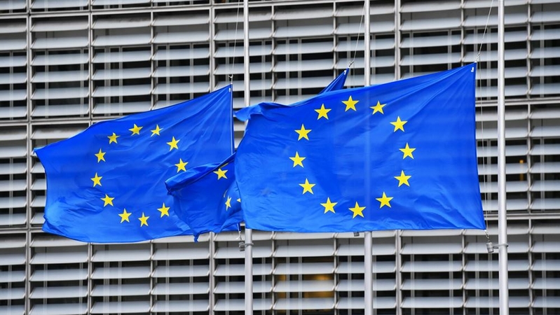 European Union (EU) flags fly at half mast following the death of Valery Giscard d'Estaing, France's former president, outside the headquarters of the European Commission in Brussels on Dec. 4, 2020. MUST CREDIT; Bloomberg photo by Geert Vanden Wijngaert.