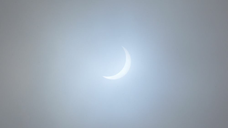 A shot of Monday's solar eclipse during partiality, about 12 minutes before totality. Clouds and rain arrived during totality. MUST CREDIT: Washington Post photo by Matthew Cappucci.