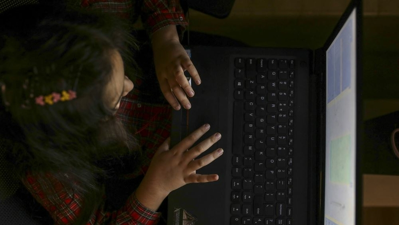 A young student attends an online Thunkable Inc. coding class at her home in Mumbai on Oct. 24, 2020. MUST CREDIT: Bloomberg photo by Dhiraj Singh.