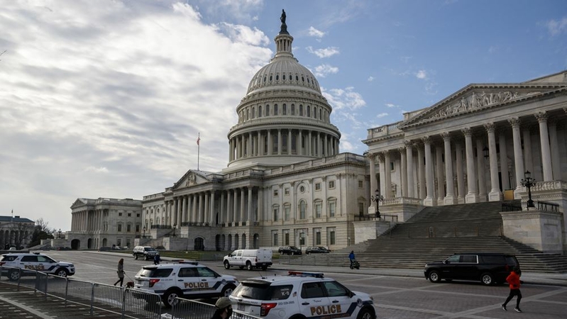 Capitol Police vehicles sit outside the U.S. Capitol Building in Washington, D.C., on Dec. 20, 2020. MUST CREDIT: Bloomberg photo by Ting Shen