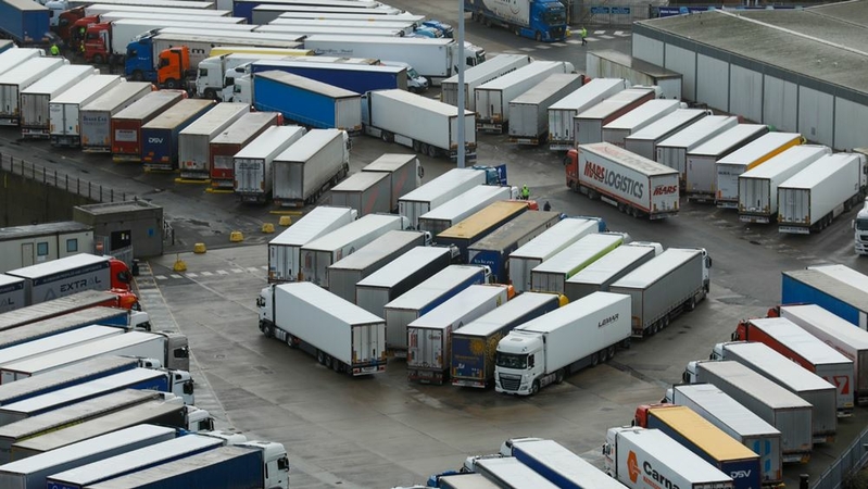 Trucks parked near the Port of Dover in Dover, England, on Dec. 22, 2020. MUST CREDIT: Bloomberg photo by Luke MacGregor