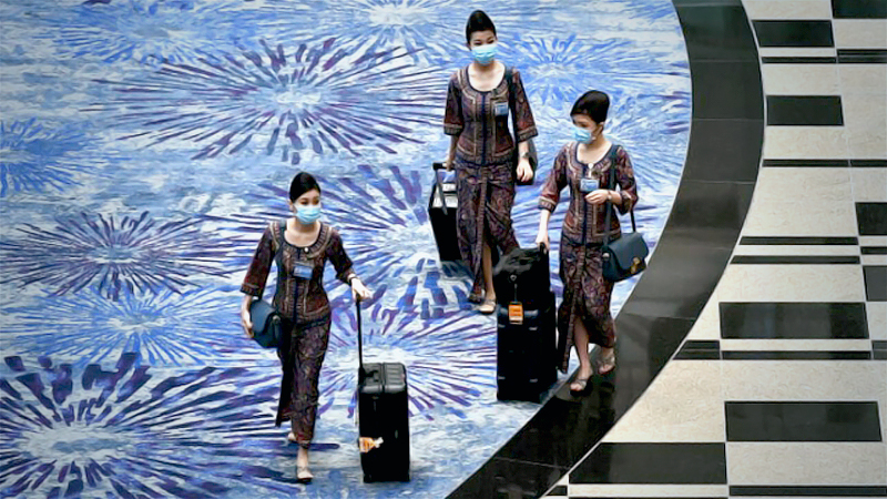 SIA cabin crew to wear N95 masks, protective overalls on flights from London amid concerns over new Covid-19 strain SIA cabin crew to wear N95 masks, protective overalls on flights from London amid concerns over new Covid-19 strain