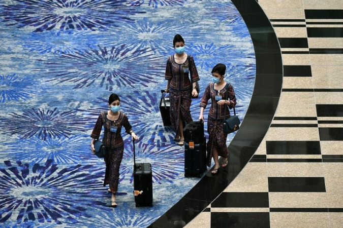 SIA said that it already has a series of precautions to protect its crew and reduce the risk of Covid-19 transmission. PHOTO: ST FILE
