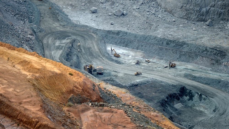 Heavy machinery operates at the Fimiston Open Pit mine, operated by Kalgoorlie Consolidated Gold Mines Ltd. in Kalgoorlie-Boulder, Western Australia, Australia, on Aug. 8, 2018. MUST CREDIT: Bloomberg photo by Carla Gottgens
