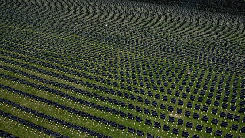 Twenty thousand chairs, each representing 10 deaths from the coronavirus pandemic in the United States, are lined up on the Ellipse south of the White House. MUST CREDIT: Washington Post photo by Katherine Frey.