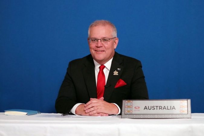 Prime Minister Scott Morrison's government has promised to supply its neighbours with Covid-19 vaccines in 2021.PHOTO: AFP/PRIME MINISTER OFFICE AUSTRALIA