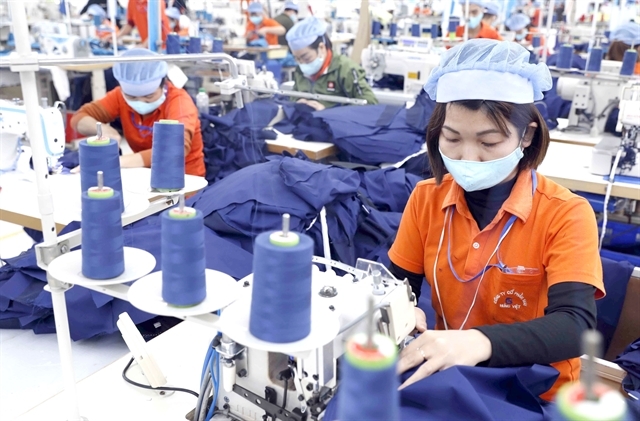 A worker at the apparel and clothing company Hưng Việt, based in the northern province of Hưng Yên, with Japan being its main export market. — VNA/VNS Photo Trần Việt