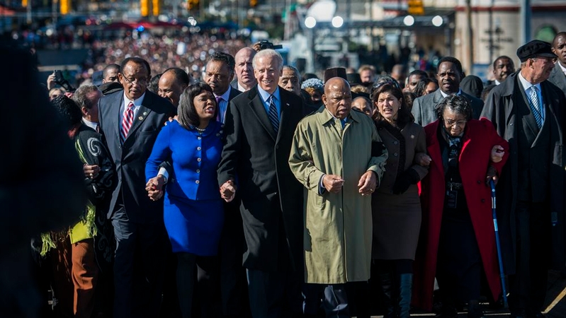 Joseph Biden walks with civil rights leaders and lawmakers over the historic Edmund Pettus Bridge in Selma, Ala., on March 3, 2013. MUST CREDIT: Washington Post photo by Melina Mara