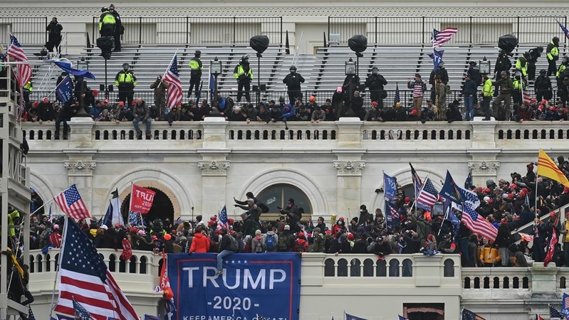 A mob riots at the Capitol on Wednesday, Jan. 6, 2021. MUST CREDIT: Washington Post photo by Matt McClain