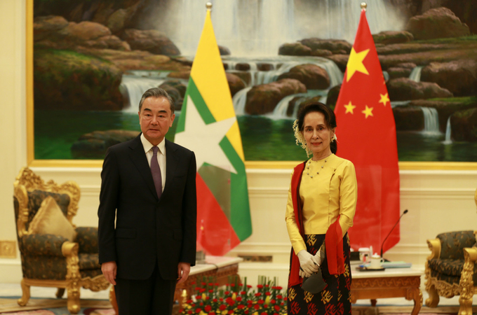 Chinese State Councilor and Foreign Minister Wang Yi meets with Myanmar State Counsellor and Foreign Minister Aung San Suu Kyi in Nay Pyi Taw, Myanmar, on Monday. ZHANG DONGQIANG/XINHUA