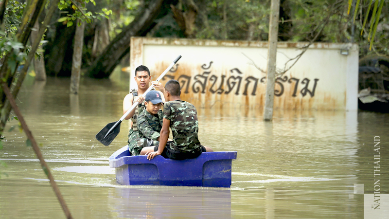Military forced to move Pattani command centre as floods swamp temple Military forced to move Pattani command centre as floods swamp temple