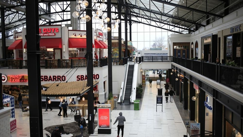 Shoppers walk through the Easton Town Center Mall in Columbus, Ohio, on Jan. 7, 2021. MUST CREDIT: Bloomberg photo by Luke Sharrett.