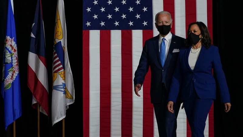 Joe Biden and Kamala Harris don masks during an August event in Wilmington, Del. MUST CREDIT: Washington Post photo by Toni L. Sandys