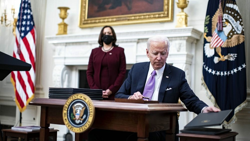 President Biden with President Harris, left, in the State Dining Room of the White House in Washington on Jan. 21, 2021. MUST CREDIT: Bloomberg photo by Al Drago.
