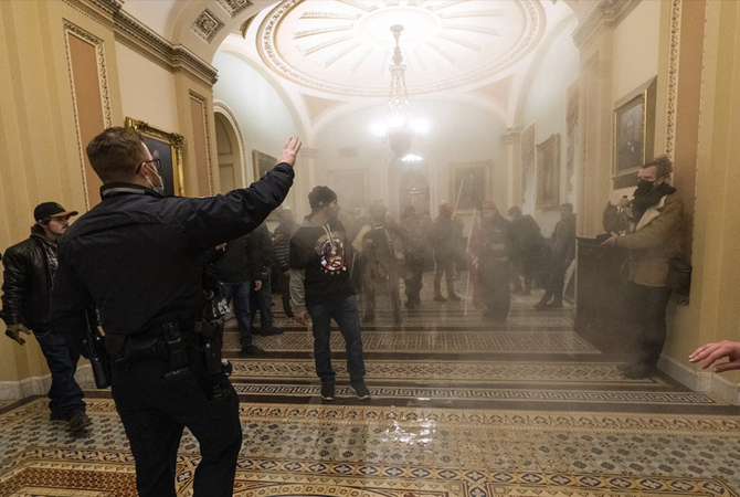 Woman charged in Capitol riot said she wanted to shoot Pelosi 'in the friggin' brain,' FBI says Woman charged in Capitol riot said she wanted to shoot Pelosi 'in the friggin' brain,' FBI says