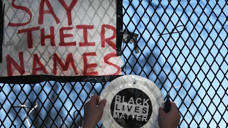 Activists remove and save art on fence near Black Lives Matter Plaza in D.C. Activists remove and save art on fence near Black Lives Matter Plaza in D.C.