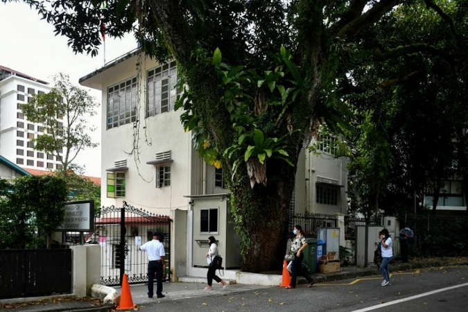 People entering the Myanmar Embassy in Singapore on Feb 1, 2021. ST PHOTO: LIM YAOHUI