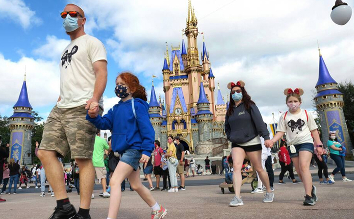With theaters and theme parks hit hard, Disney revenue fell 22% over the holidays With theaters and theme parks hit hard, Disney revenue fell 22% over the holidays