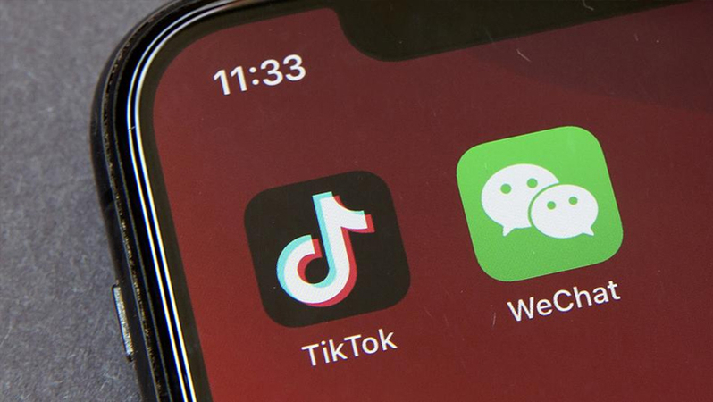 Biden asks for pause in Trump's effort to ban WeChat Biden asks for pause in Trump's effort to ban WeChat
