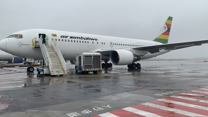 A Zimbabwean airplane commissioned to transport the first batch of Chinese-donated COVID-19 vaccine doses is parked on tarmac at Beijing Capital International Airport in Beijing, Feb 14, 2021. [Photo/Xinhua]