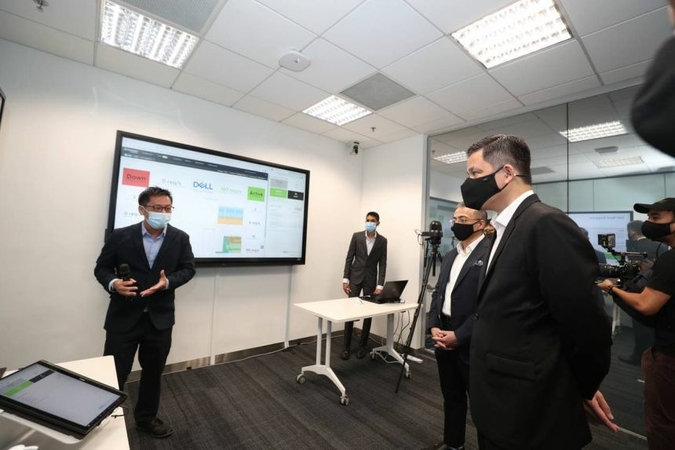 Minister for Trade and Industry Chan Chun Sing (right) at the launch of the Dell Technologies hub at International Business Park on Feb 22, 2021. ST PHOTO: TIMOTHY DAVID