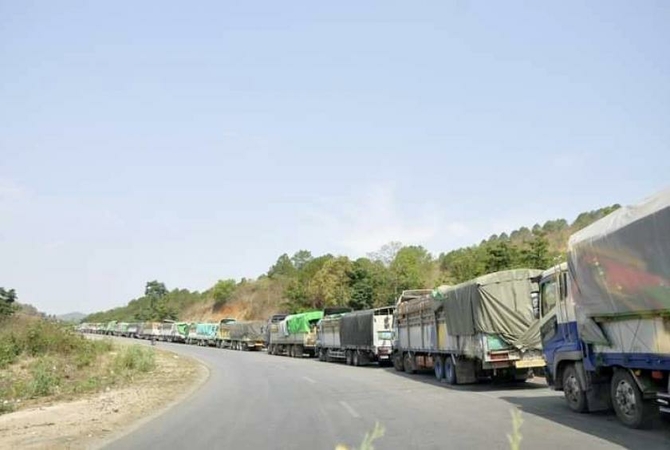 Fruit trucks waiting to enter China (Photo-Pyae Sone)