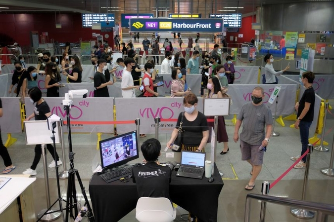 About 4.7 million residents have the TraceTogether app or have collected the TraceTogether tokens. ST PHOTO: GAVIN FOO