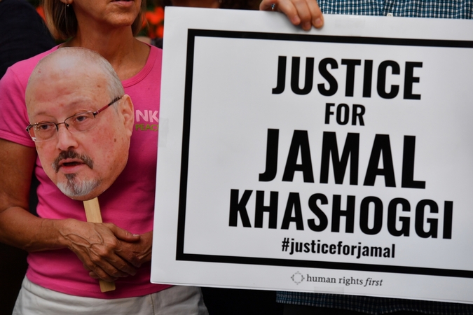  The Committee to Protect Journalists along with other press freedom and human rights groups hold a candlelight vigil in front of the Saudi Embassy in Washington on the first anniversary of journalist Jamal Khashoggi's murder, Oct. 2, 2019. 
Washington Post photo by Marvin Joseph. 