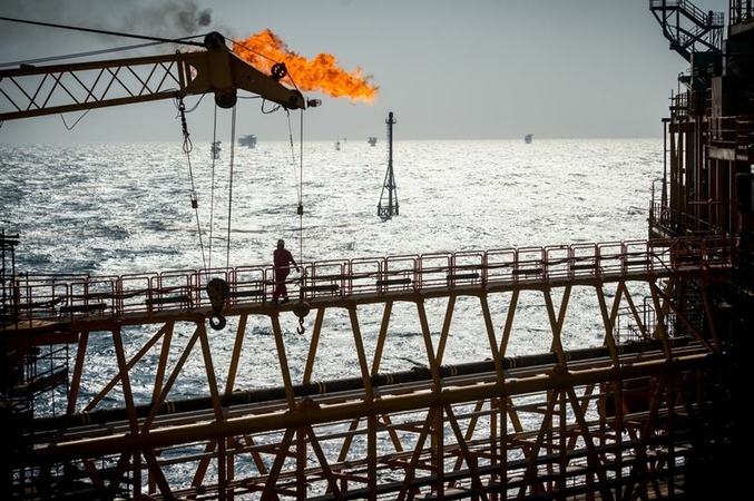 A gas flare burns from a pipe aboard an offshore oil platform in the Persian Gulf's Salman Oil Field, operated by the National Iranian Offshore Oil Co., near Lavan island, Iran, on Jan. 5. 2017. MUST CREDIT: Bloomberg photo by Ali Mohammadi