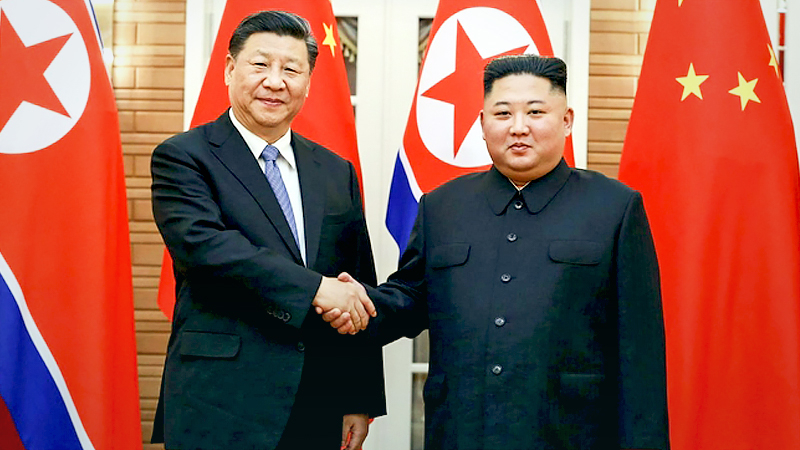 Chinese President Xi Jinping (L) shakes hands with North Korean leader Kim Jong-un prior to their summit talks in Pyongyang on June 20, 2019, in this photo released by the North's official Korean Central News Agency. (KCNA-Yonhap)