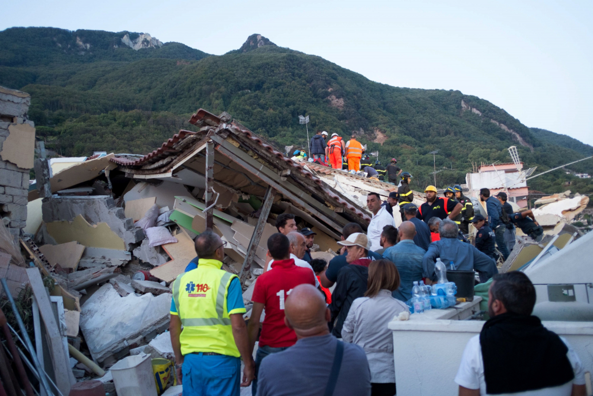 Rescuers rush to free last child after quake hits Italian island