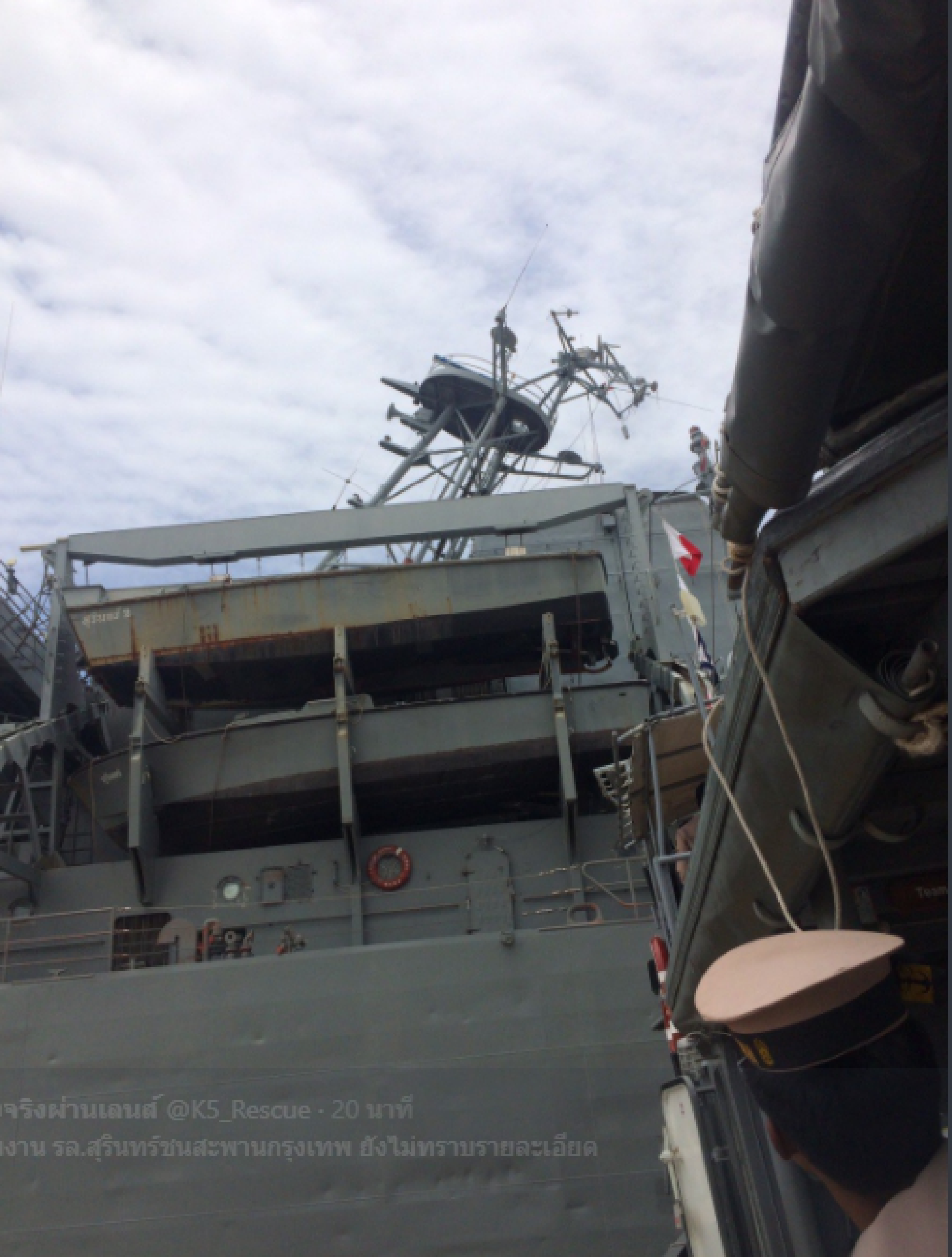 Navy ship hits drawbridge, mast loose