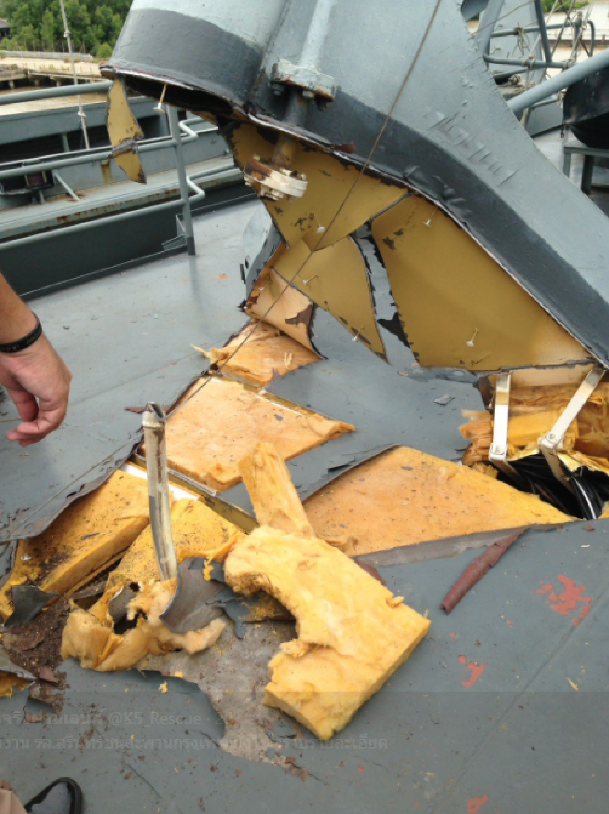 Navy ship hits drawbridge, mast loose