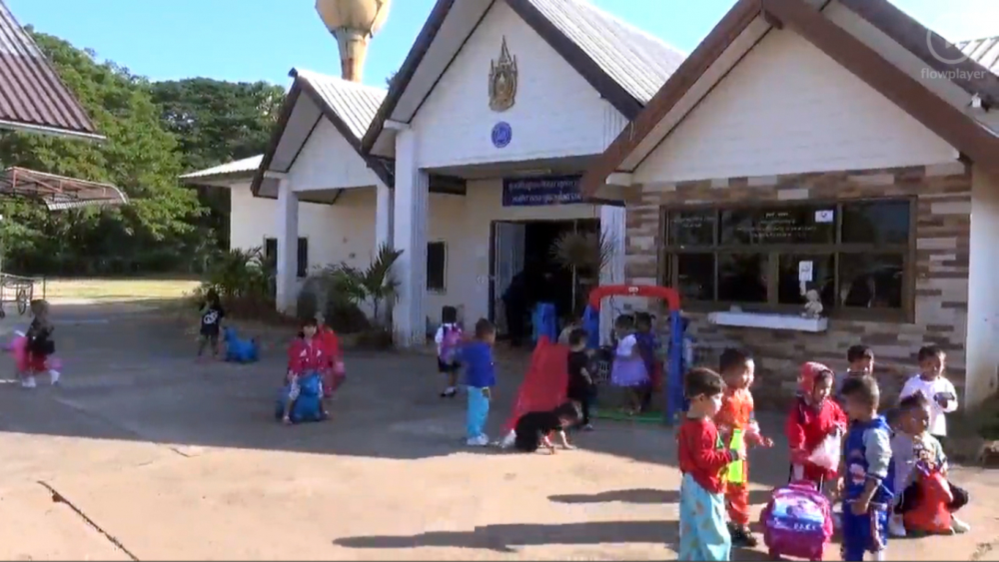 Schoolchildren in chilly Northeast do exercises to stay warm
