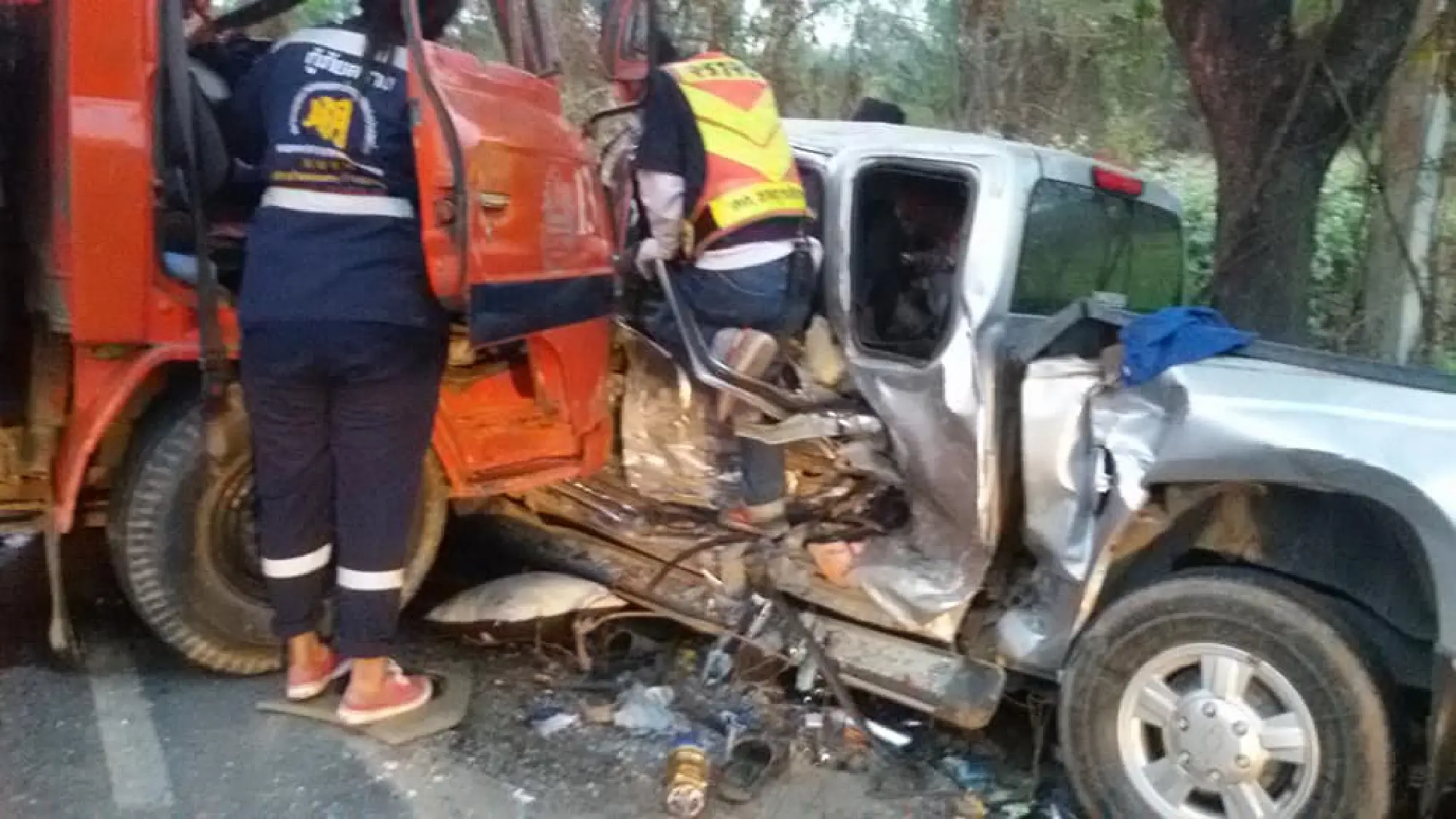 Two killed after pickup crashes into truck carrying students