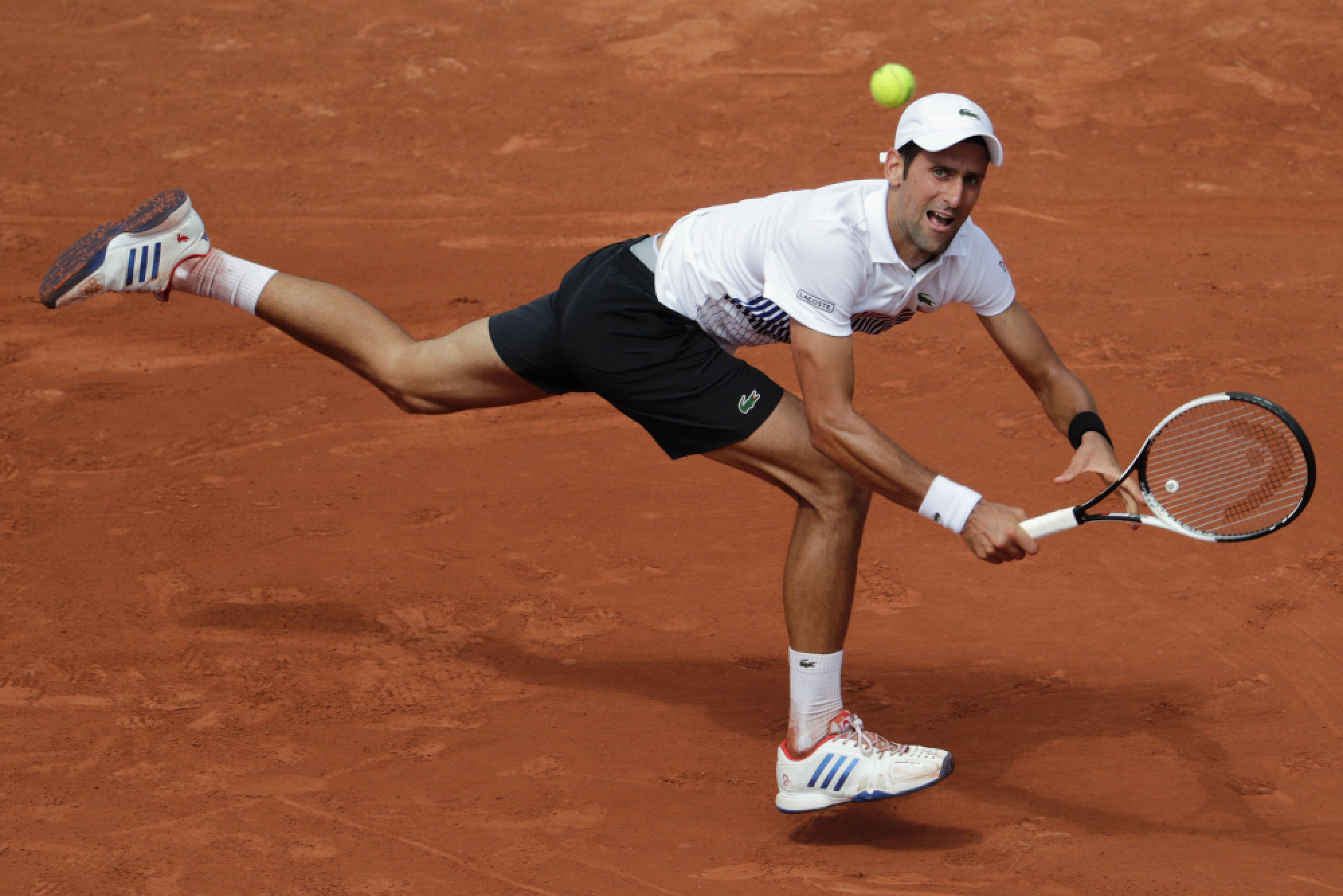 Nadal, Djokovic march on as Muguruza survives
