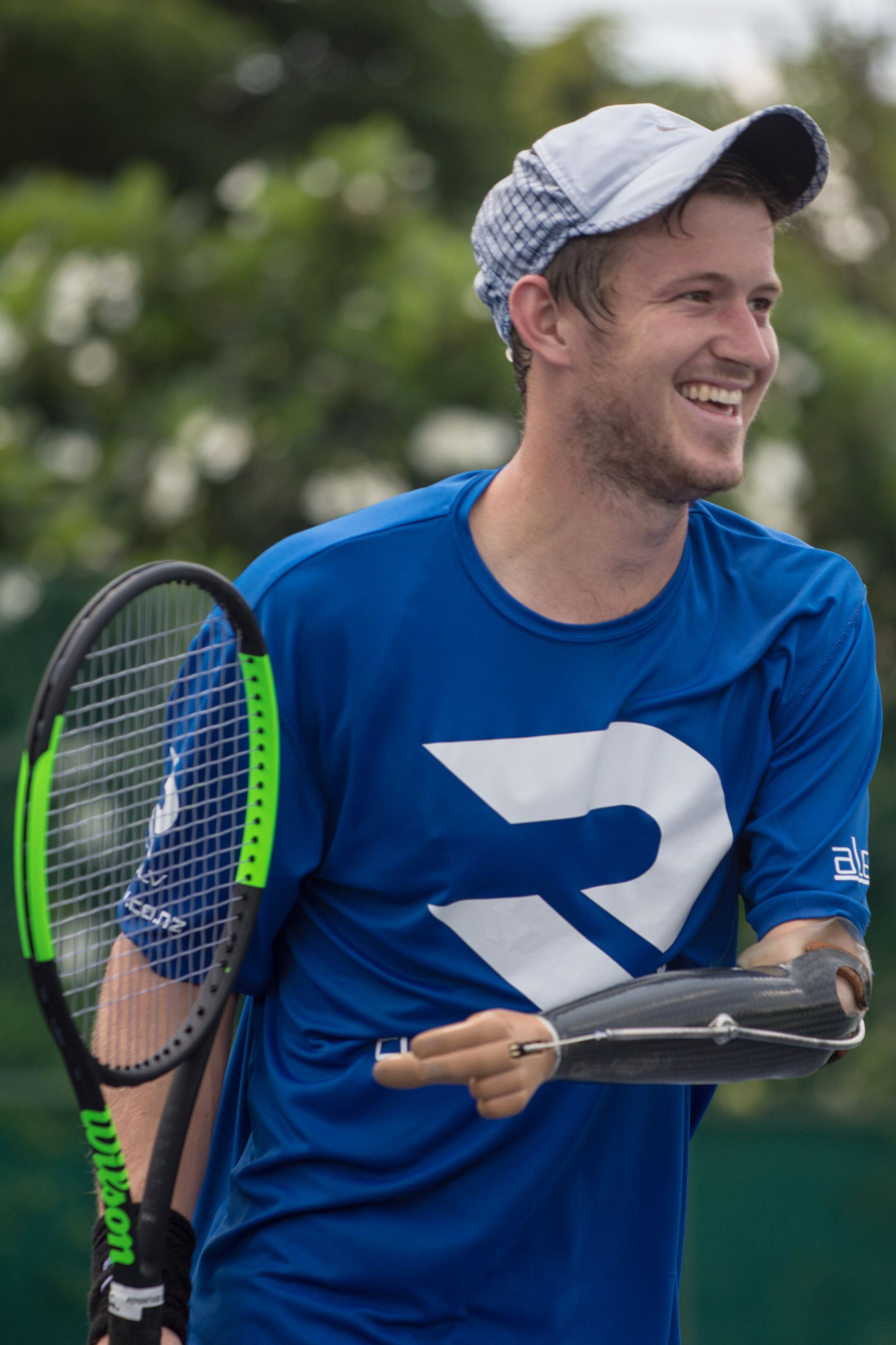 Dream achieved for one-armed tennis player Hunt