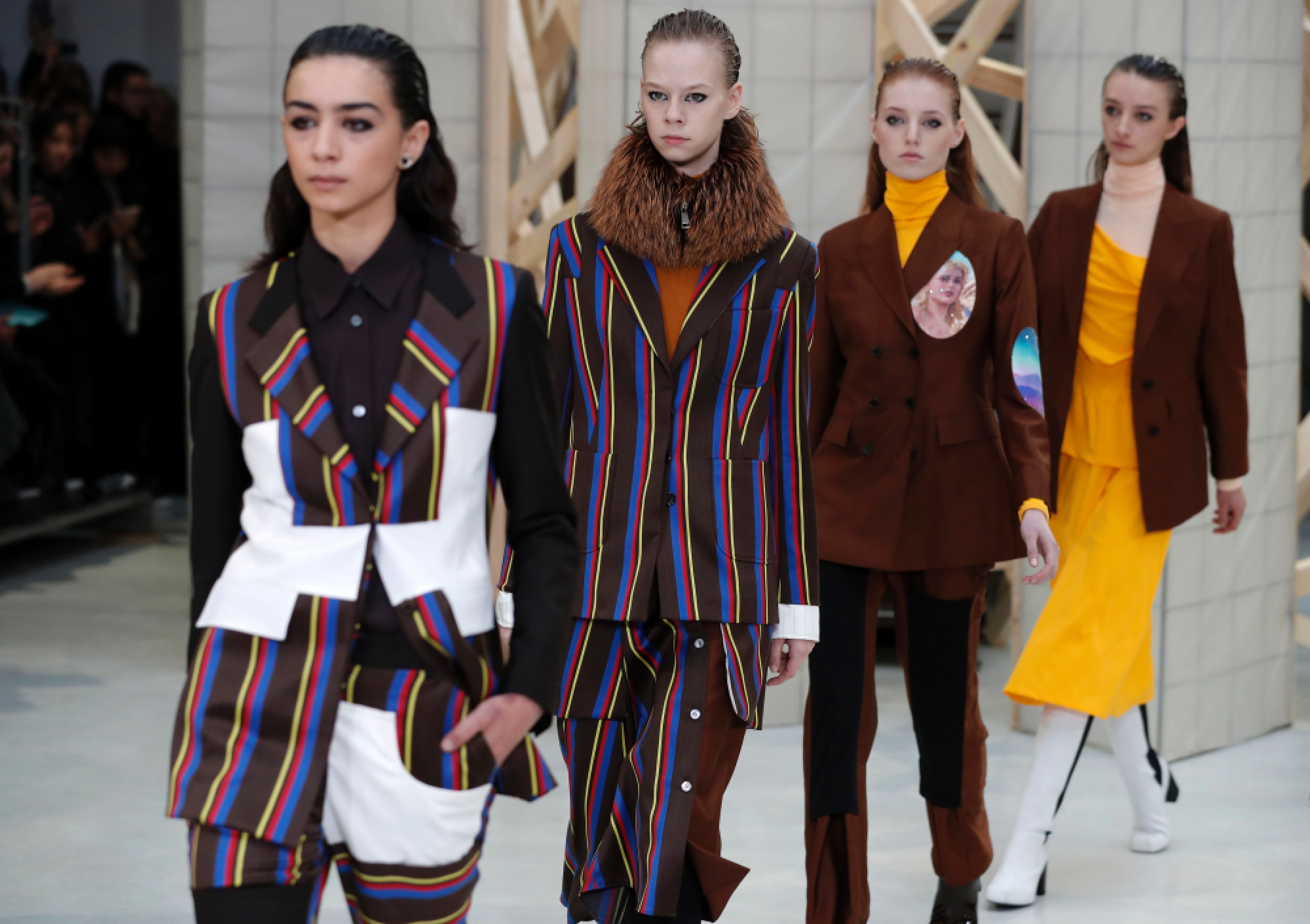   Women make grab for men's ties on Paris catwalk