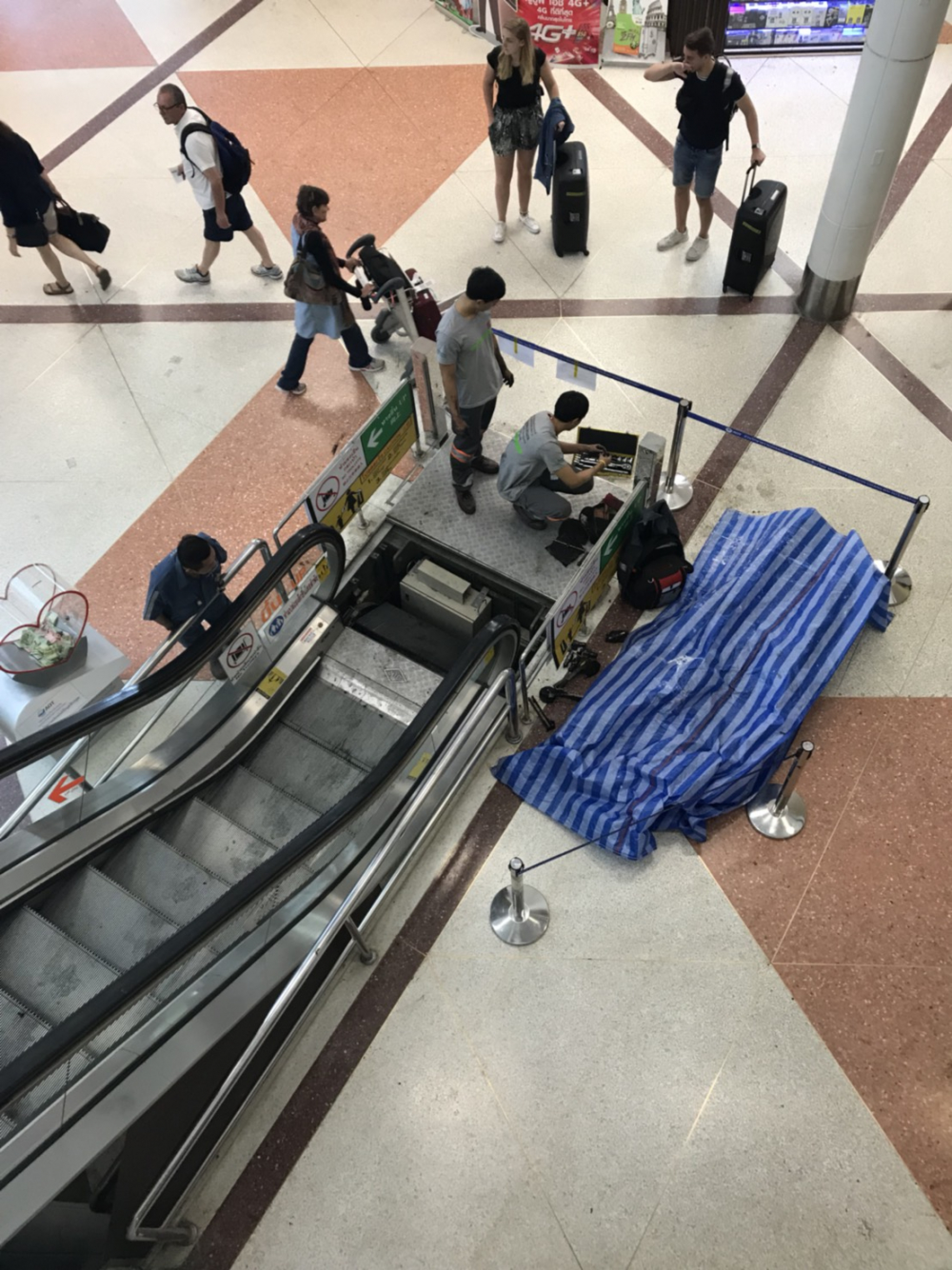 Escalator at Chiang Mai airport partially collapses