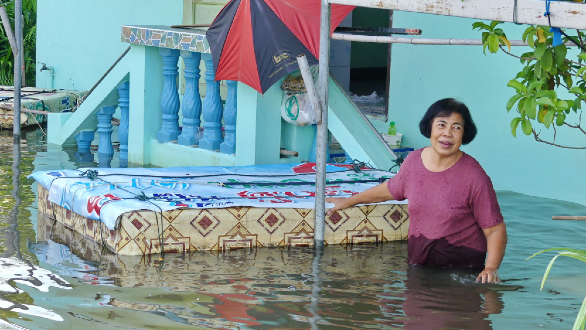 Dam gates open in urgent effort to control flooding
